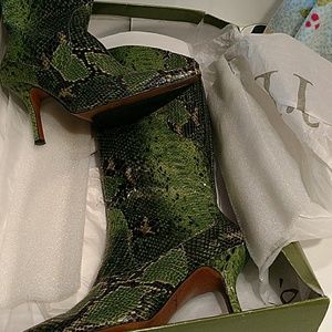 Green snakeskin zip up boots